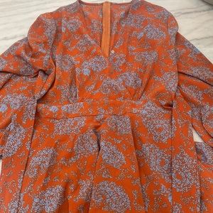 Long sleeve orange romper